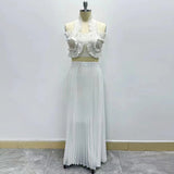 French Elegant Wind Two Sets 2025 New Chest Hanging Neck Loaf Side Top + High Waist Pressure Folded Skirt Dress 68HZ